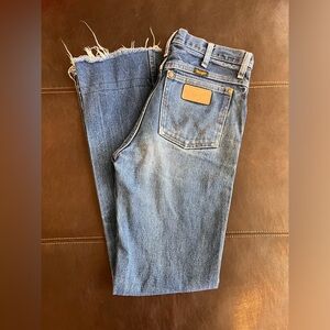 Cropped cowboy cut wranglers